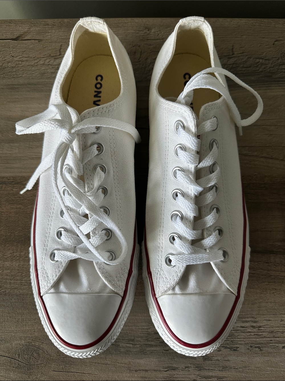 Converse White Canvas Low Top Sneakers with Red Stripe

Unisex
Men  9
Women 11